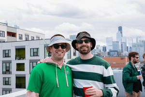 Two Men wearing Brims hats at party in Chicago